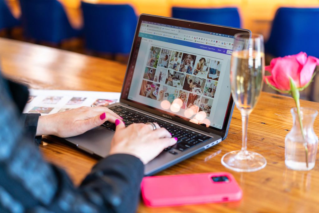 Woman on a laptop looking at a creative direction brief.